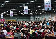 Four halls combined into a column-free venue for Hong Kong's largest-ever indoor banquet. 9,000 delegates enjoyed a sumptuous dinner around 750 tables!